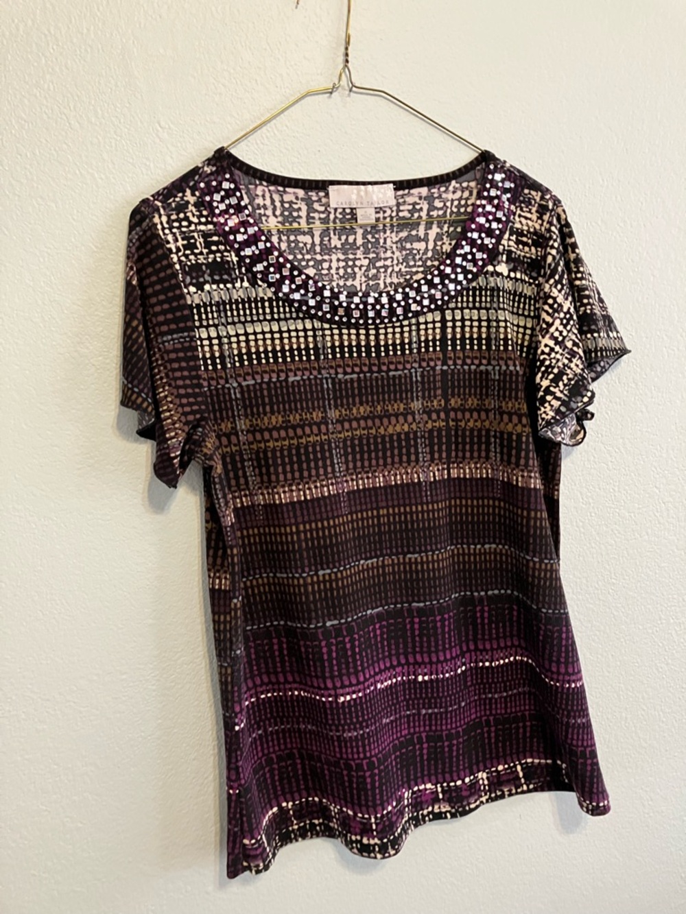 Carolyn Taylor Short Sleeve Top With Silver Looking Bangles On Front Neckline
